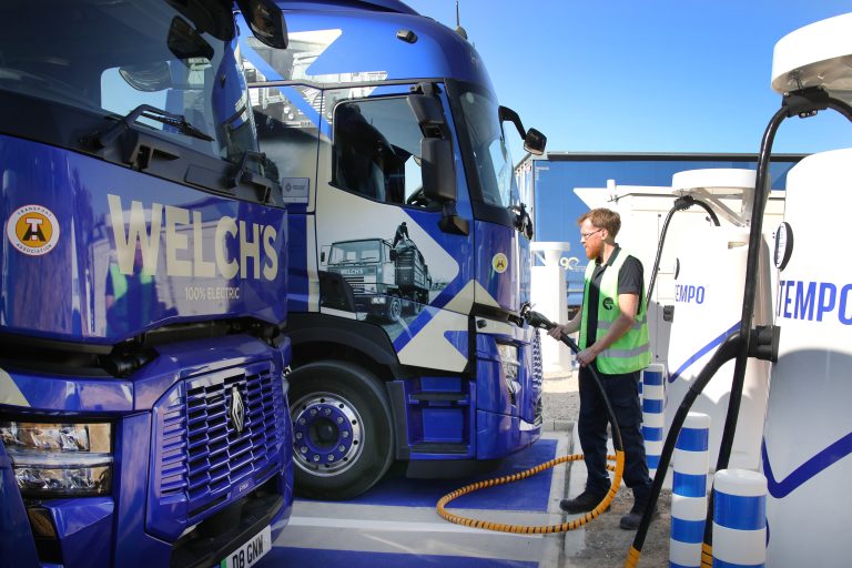 Man charging a Welch's truck with the Voltempo HyperCharger.